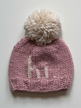 Huggalugs hi. Rosy Baby Girl Pom Pom Beanie Hat - Size: Small (0-6M)